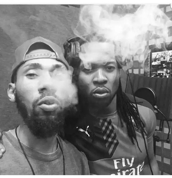 Rapper Phyno Caught Smoking At A Musical Session With Singer Flavour